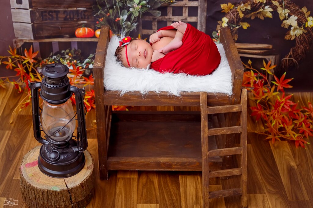 Newborn Cot With Red Wrapping Setup 123